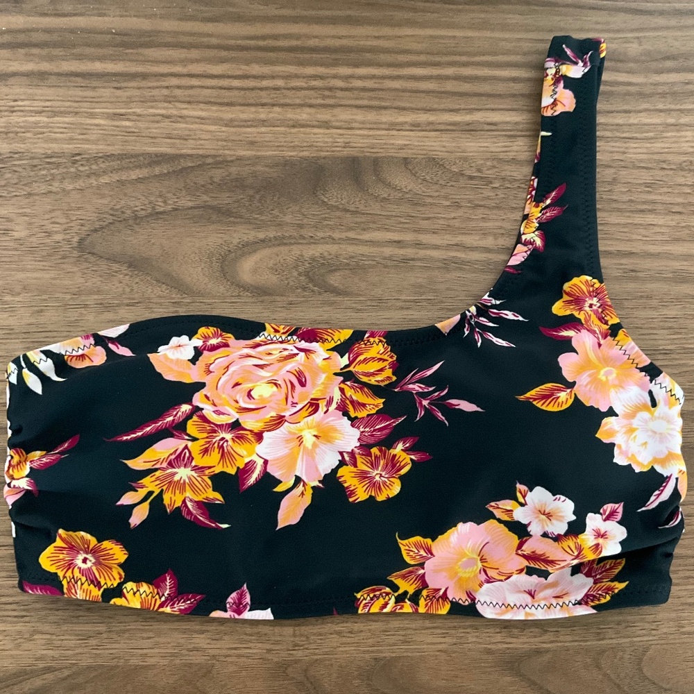 Black with floral designs one shoulder bikini swim to by Volcom, size small